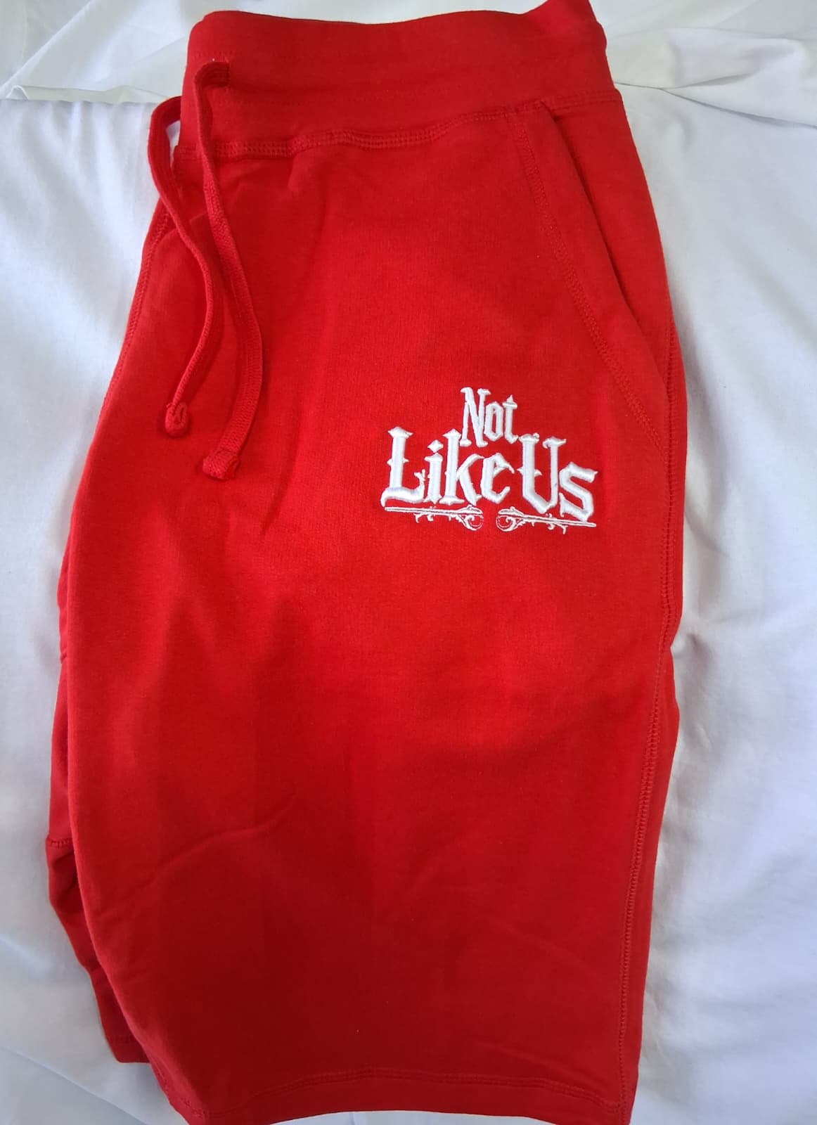 Not Like Us Red Shorts